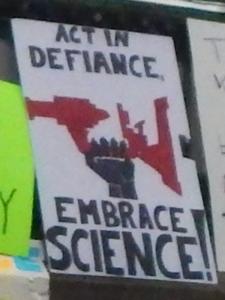 Act in Defiance, Embrace Science